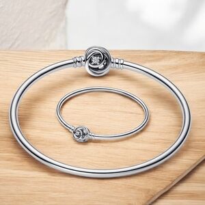 PANDORA Moments Sterling Silver Encircled Clasp Rigid Bangle Bracelet With CZ